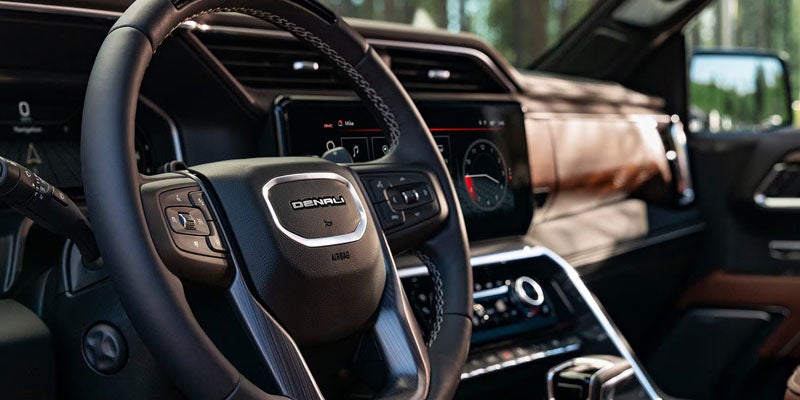 2026 GMC Sierra 1500 driver cockpit and controls at Gilland GMC